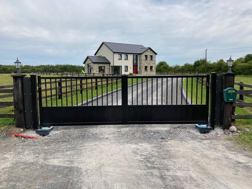 Gate 043 - Black vertical-bar gate, solid kickplate