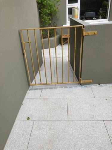 Gate 050 - Small gold vertical-bar patio gate